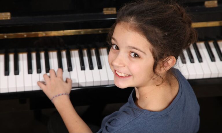 young girl starting piano lessons in Sugar Land
